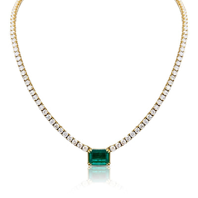 18K Gold Emerald & Diamond Tennis Necklace – Designer Fine Jewelry by Tresor Collection 18K gold emerald and diamond tennis necklace flatlay – luxury fine jewelry by Tresor Collection