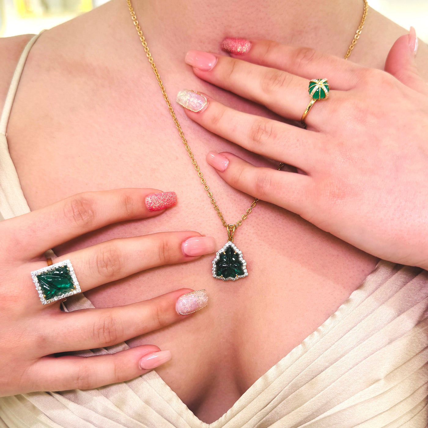 emerald- diamond carved pendant with matching ring and a button ring. collection designed and manufactured by the tresor collection