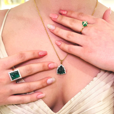 emerald- diamond carved pendant with matching ring and a button ring. collection designed and manufactured by the tresor collection
