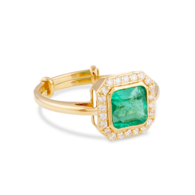 18K Gold Emerald & Diamond Ring – Tresor Collection Gold emerald ring with diamond halo flatlay – square-cut emerald gemstone in elegant geometric setting