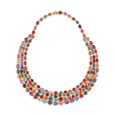 A multicolored tourmaline and diamond necklace in 18K yellow gold. 18K gold multicolor tourmaline necklace flatlay – luxury fine jewelry by Tresor Collection