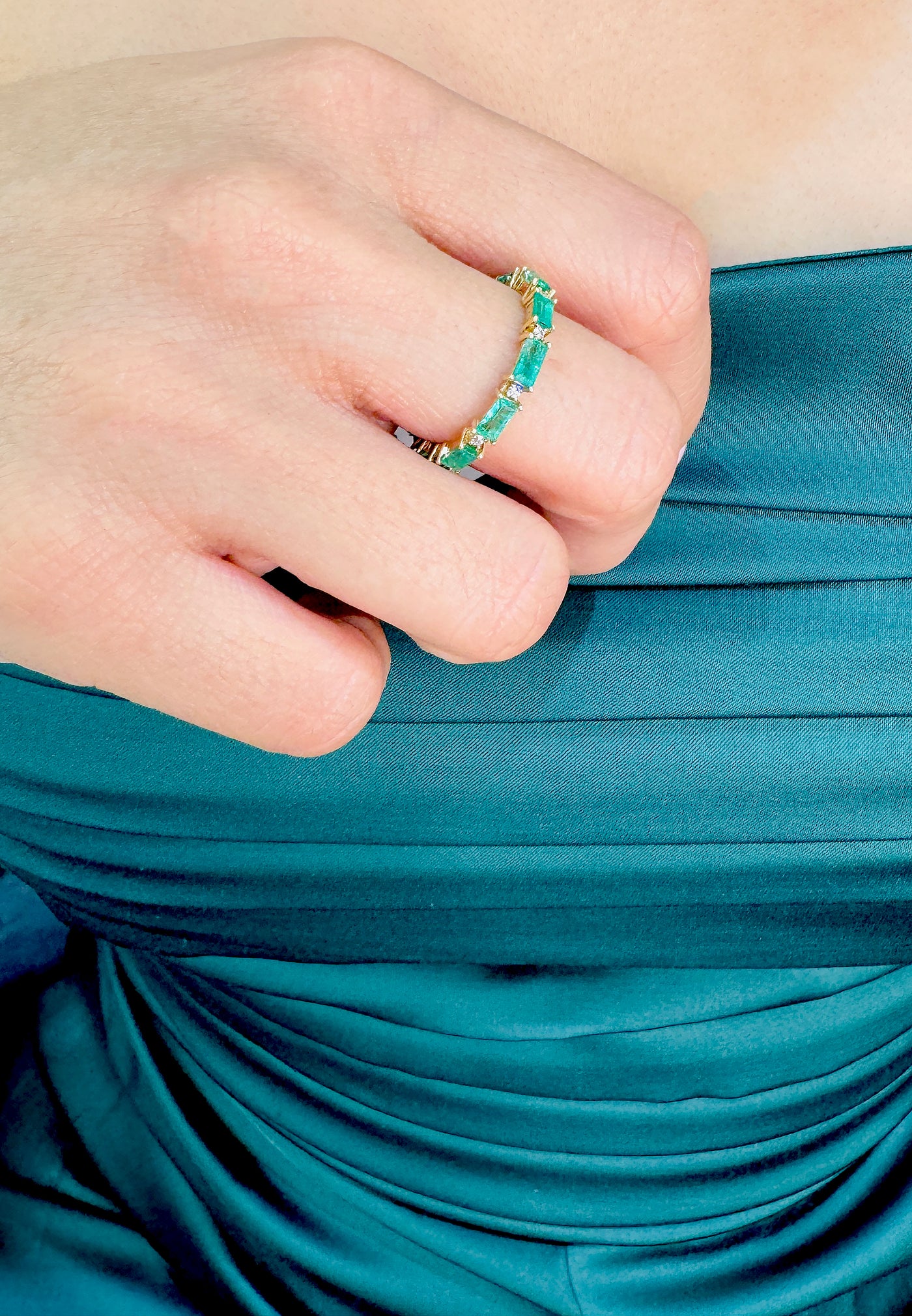 Emerald Rectangle And Diamond Ring In 18K Yellow Gold - Tresor Collection Styled shot of emerald eternity band ring on model – modern elegant fine jewelry