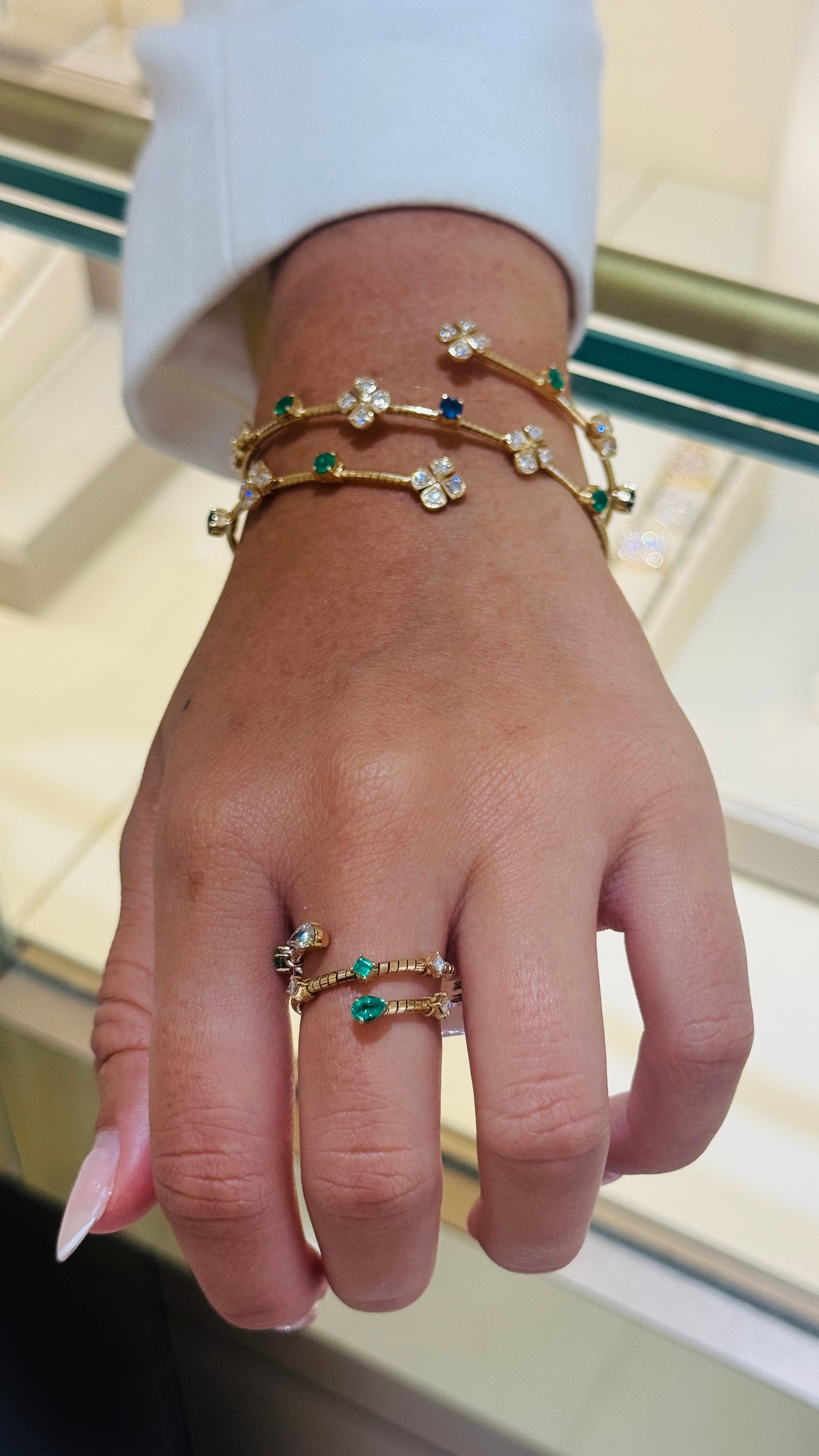 Emerald, Blue Sapphire Round And Diamond Bangle In 18K Yellow Gold