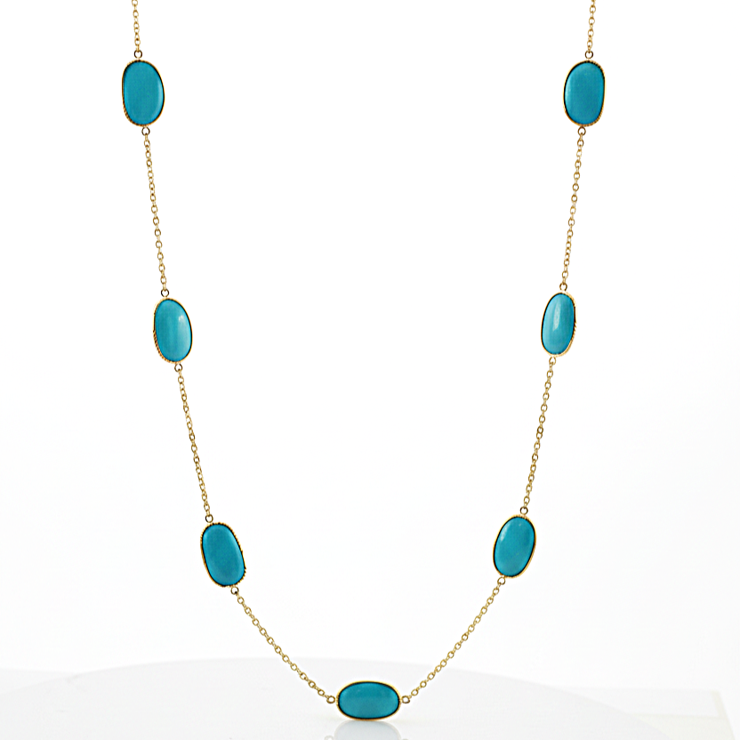 Turquoise stone necklace on a white background 18K gold turquoise necklace flatlay – handcrafted gemstone jewelry by Tresor Collection