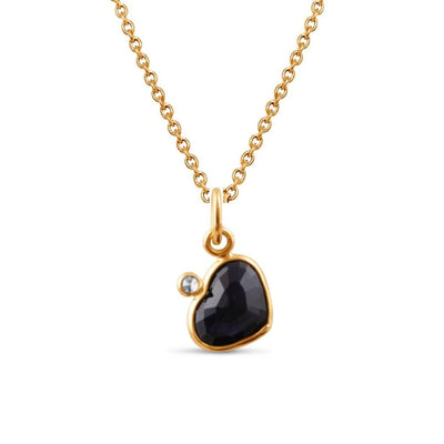 18K Gold Dark Purple Spinel & Diamond Heart Pendant – Flora Collection 18K gold black sapphire heart pendant necklace flatlay – handcrafted fine jewelry by Tresor Collection
