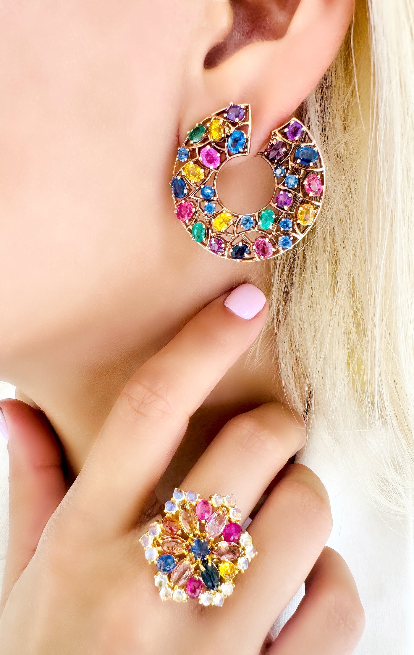 Multishape Multicolor Gemstone Ring In 18K Yellow Gold - Tresor Collection Close-up of multicolor gemstone cluster ring on model – colorful sapphire and ruby fine jewelry