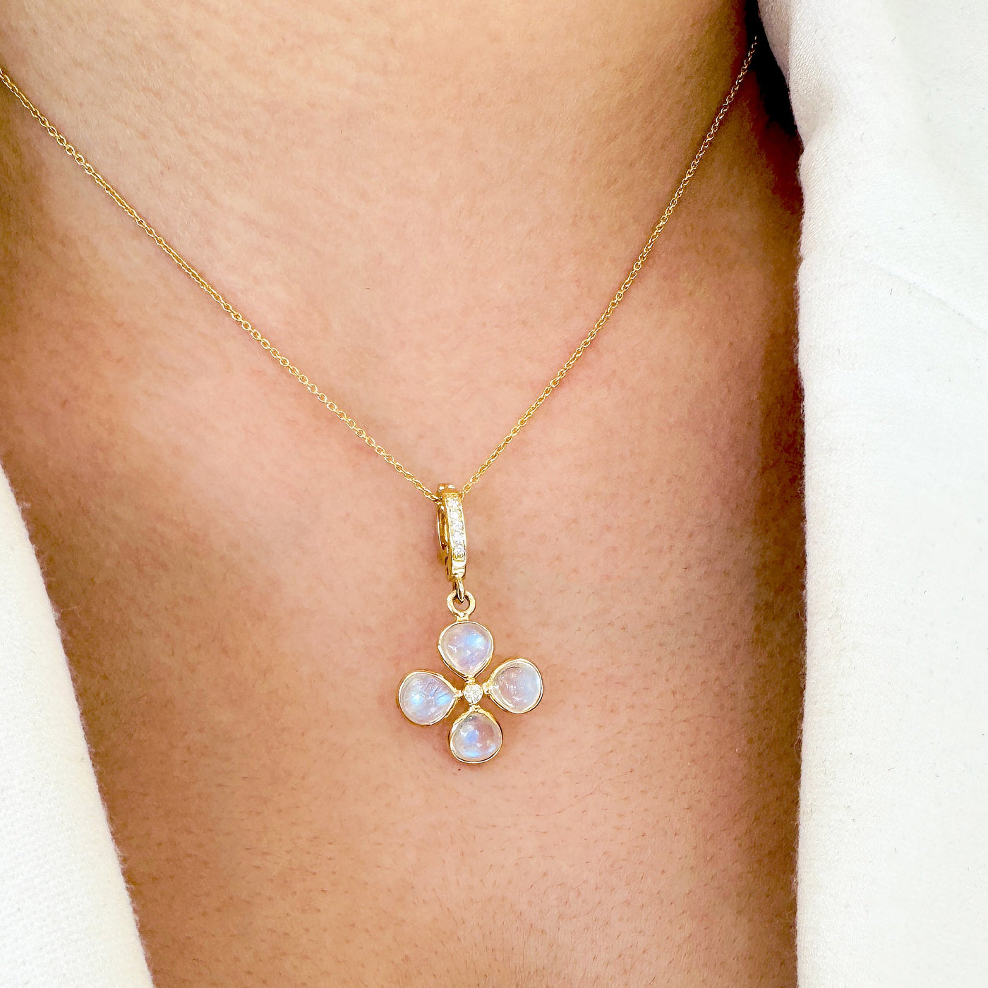 Rainbow Moonstone & Diamond Four Leaf Clover Pendant In 18K Yellow Gold - Tresor Collection Model wearing 18K gold Rainbow Moonstone pendant necklace – luminous gemstone jewelry styling