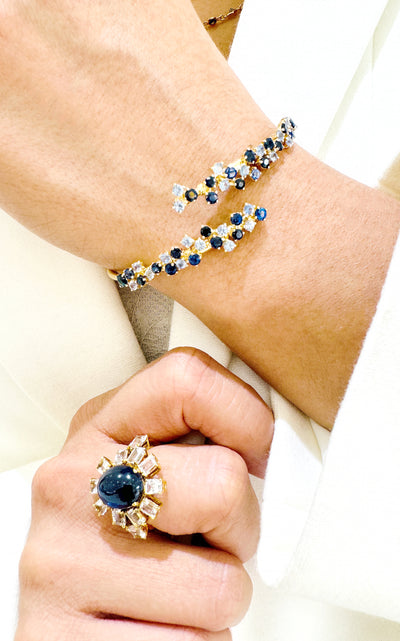 18K Gold Light & Dark Blue Sapphire Bracelet – Symphony Collection - Tresor Collection Blue Sapphire and Diamond statement ring paired with gold bracelet – sophisticated gemstone jewelry styling