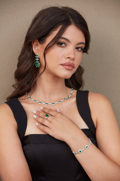 Emerald Oval & Diamond Bracelet In 18K White Gold - Tresor Collection White gold emerald bracelet and necklace on model – luxurious green gemstone style