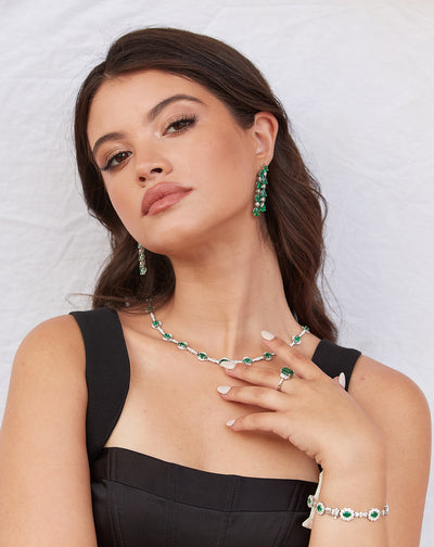 Emerald Pear Shape & Diamond Earring In 18K White Gold - Tresor Collection Elegant woman wearing emerald and diamond drop earrings – fine jewelry by Tresor Collection