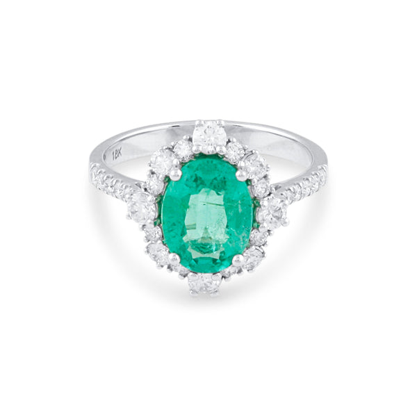 18K White Gold Emerald & Diamond Oval Ring by Tresor Collection Oval-cut emerald and diamond halo ring in 18K white gold – fine handcrafted jewelry by Tresor Collection