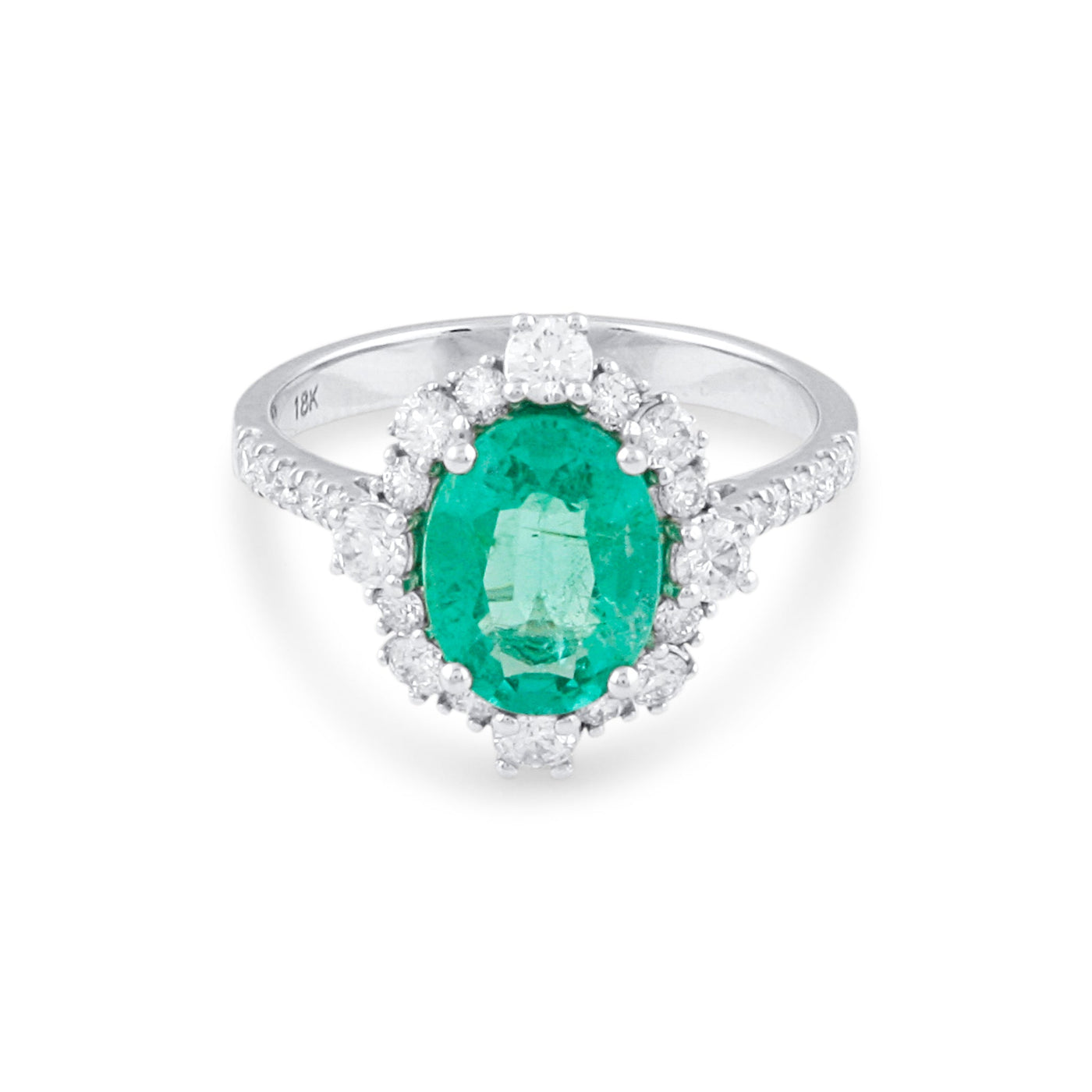 18K White Gold Emerald & Diamond Oval Ring by Tresor Collection Oval-cut emerald and diamond halo ring in 18K white gold – fine handcrafted jewelry by Tresor Collection