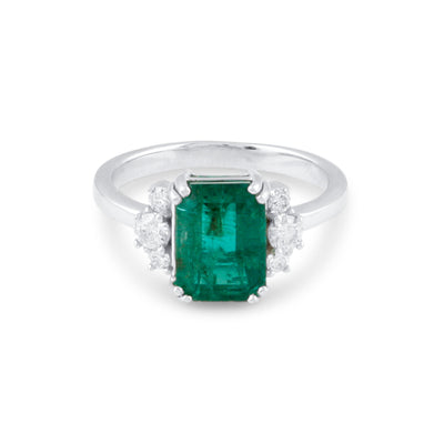 18K White Gold Emerald & Diamond Rectangular Ring by Tresor Collection White gold emerald-cut emerald ring flatlay – luxury green gemstone jewelry by Tresor Collection
