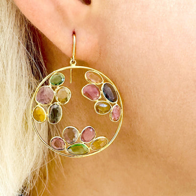 Elegant multi-gemstone hoop earrings on model – 18K gold designer jewelry for women by Tresor Collection