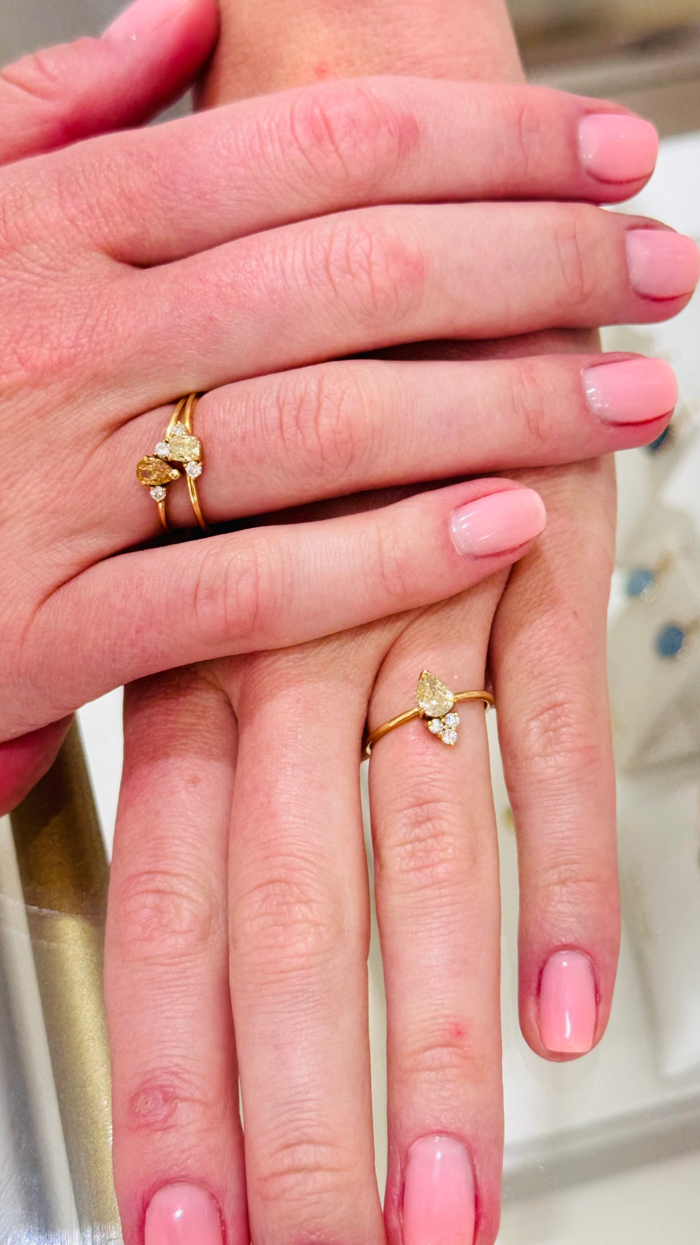 Diamond Pear Shape And Diamond Round Ring In 18K Yellow Gold - Tresor Collection Styled shot of yellow diamond gold ring worn on hand – premium handcrafted jewelry look