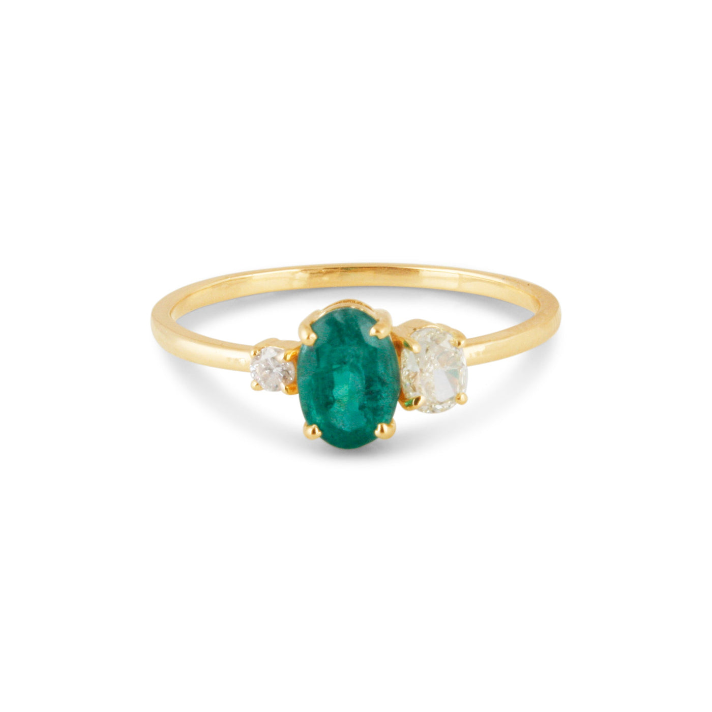 18K gold emerald and diamond ring flatlay – handcrafted fine jewelry by Tresor Collection