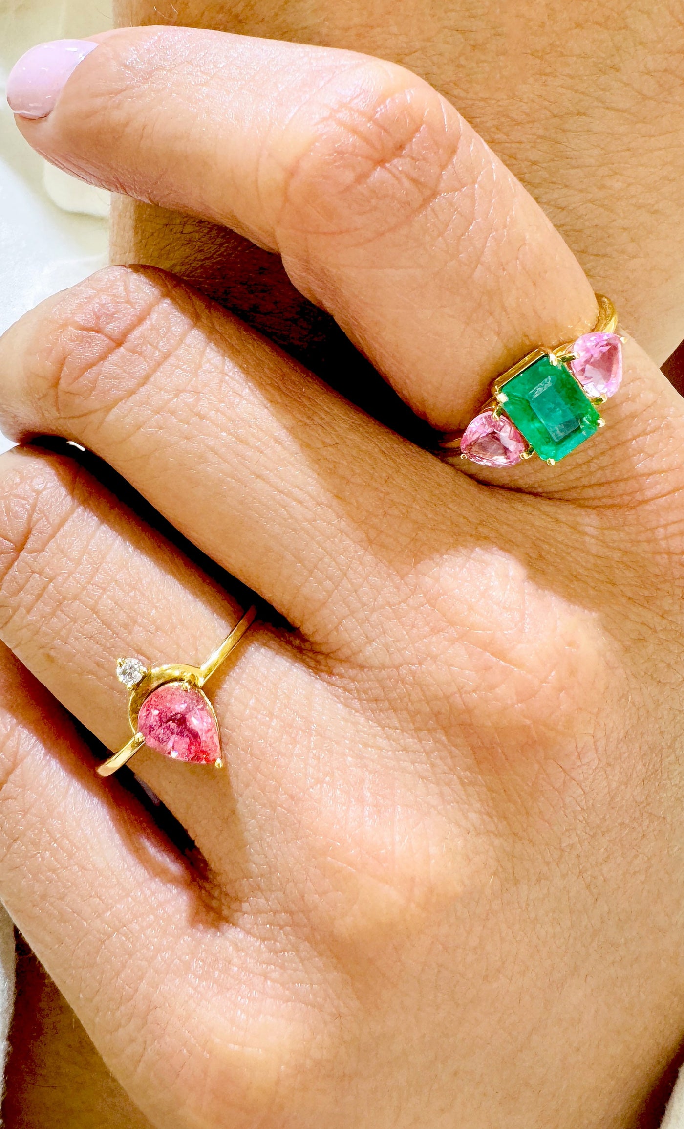 Pear-cut pink tourmaline ring on hand – fine 18K gold gemstone jewelry by Tresor Collection