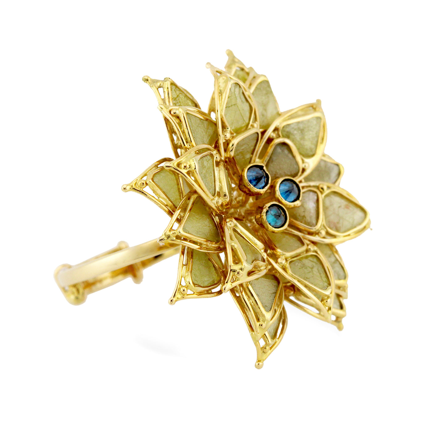 Top view close-up of floral ring – handcrafted 18K yellow gold with blue stone accents by Tresor Collection