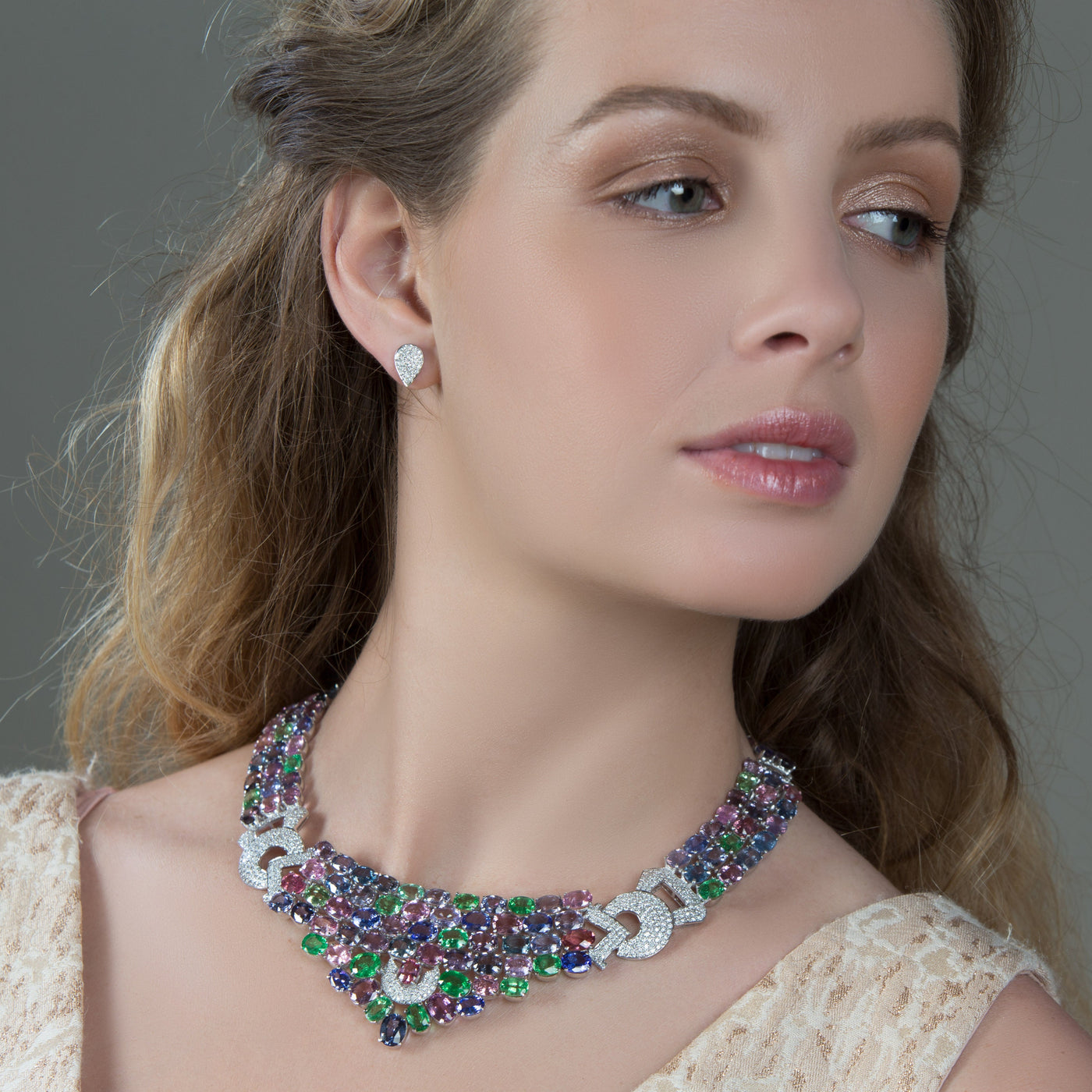 Elegant multicolor gemstone necklace on model – designer gold jewelry for women by Tresor Collection