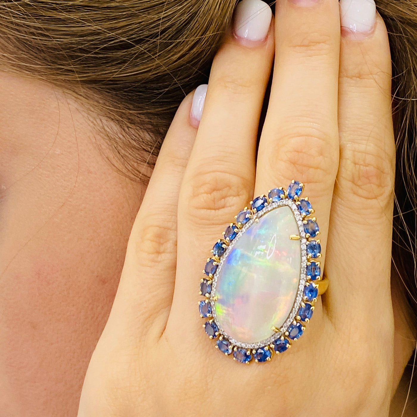 Ethiopian opal and sapphire statement ring styled for parties and weddings – Tresor Collection