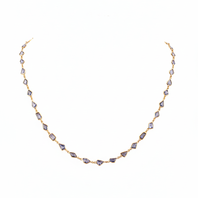 Necklace with purple beads on a white background 18K gold blue sapphire necklace flatlay – luxury fine jewelry by Tresor Collection
